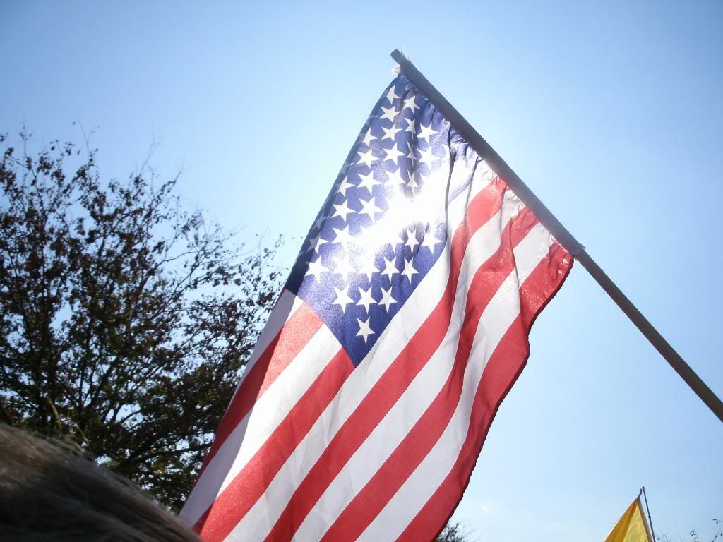 I just liked the shot with the sun shining through the flag.